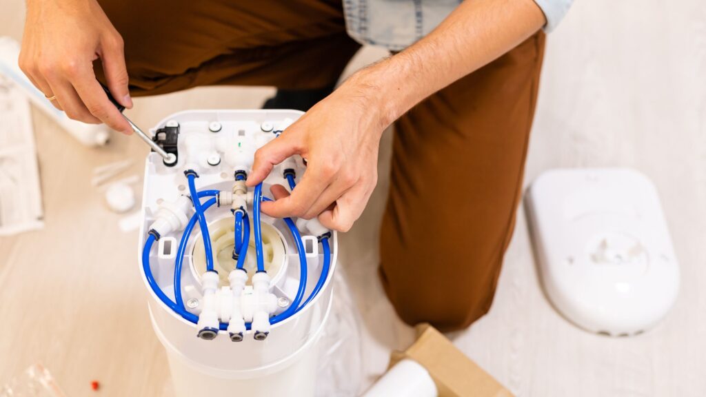 appliances expert team repairing ro water purifier service in greater noida