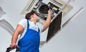 appliances xpert team repairing chimney service in greater noida
